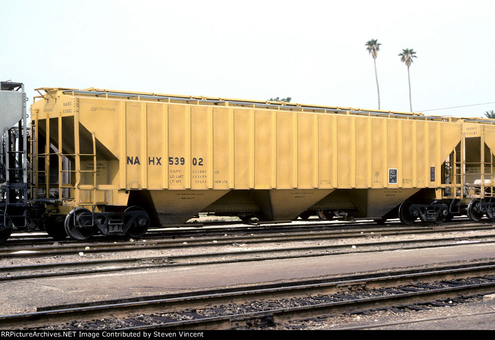 Yellow covered hopper NAHX #53902 leased to C-C-F Grain Co Inc.